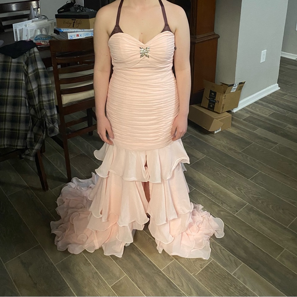 This was a wedding dress that just wasn’t what was wanted never worn.
